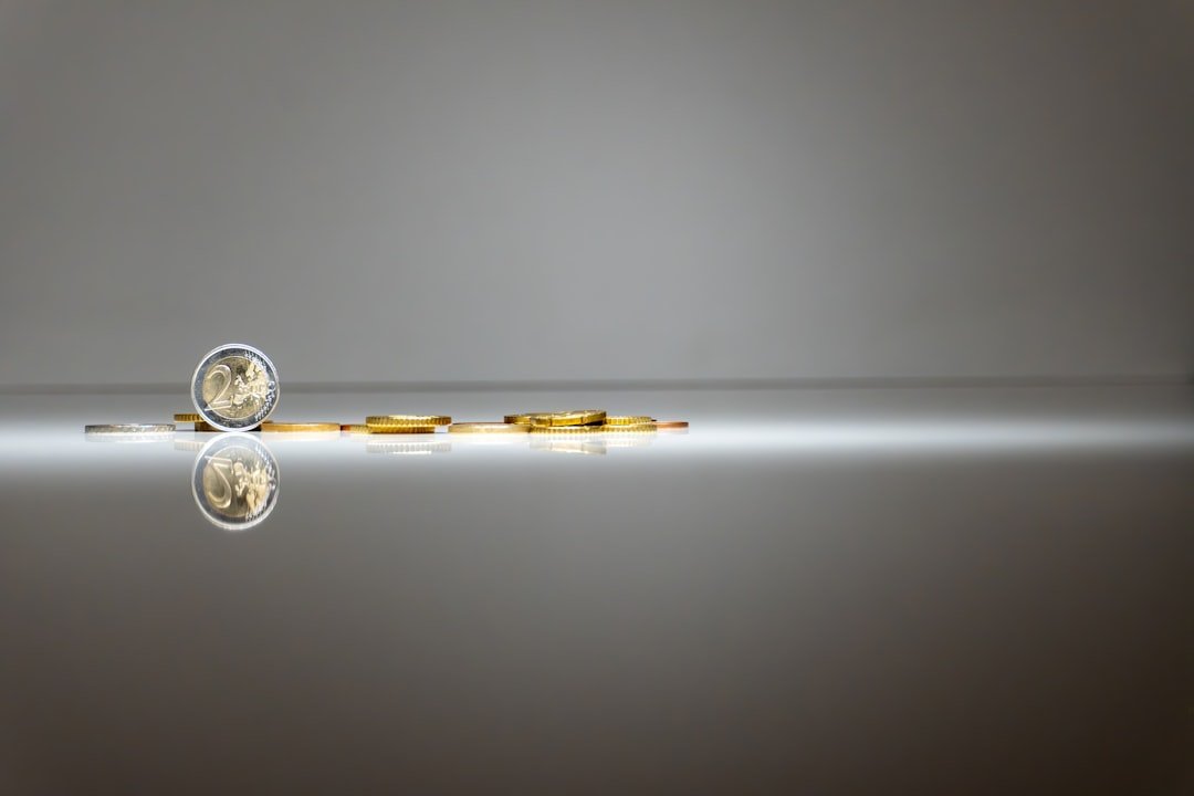 Strategic Planning in the Modern Era: Building a Roadmap for Long-Term Success a-pair-of-gold-coins-sitting-on-top-of-a-reflective-surface-5ovkuhlw63u